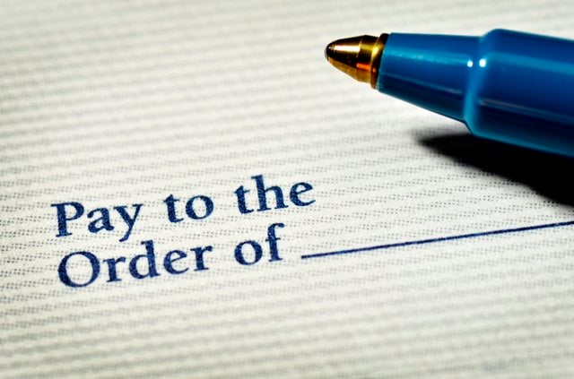 What Happens If I Cash a Fraudulent Check?