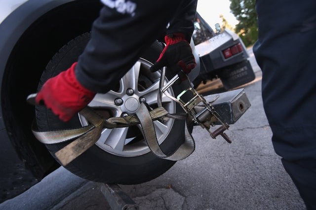 What About Title, Tags & Insurance After Car Repossession?